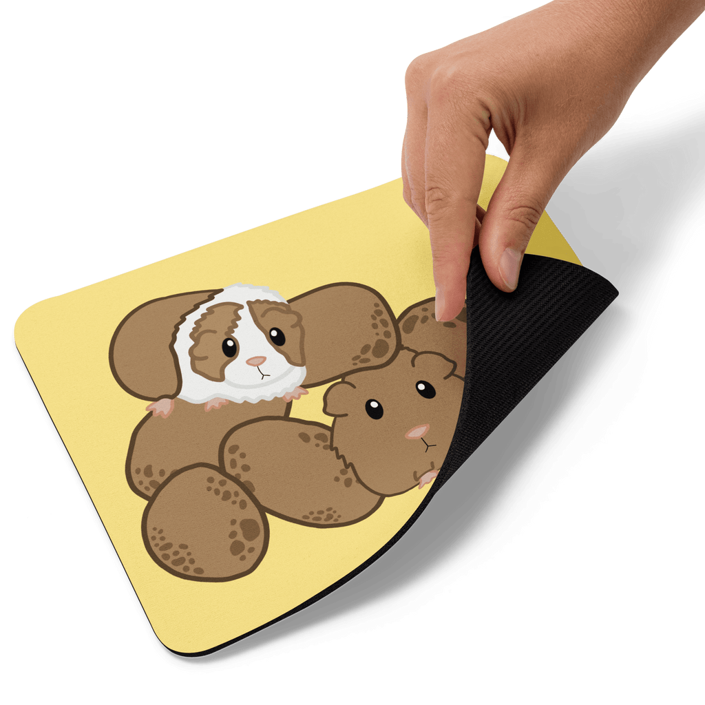 Cute Guinea Pig Mouse Pad positioned alongside office supplies, illustrating its fun style for animal lovers.