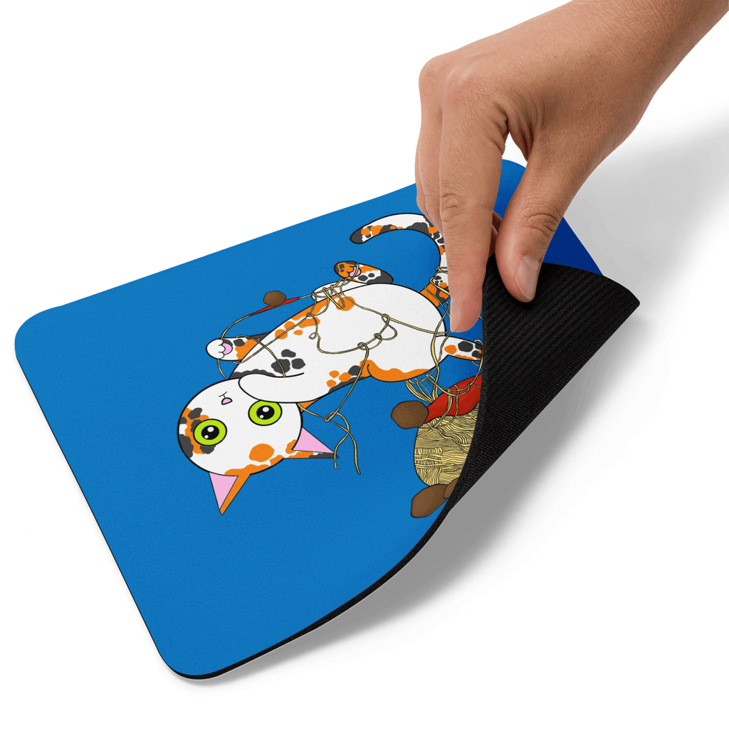 Side view of the Adorable Naughty Cat Mouse Pad highlighting the soft polyester surface and natural rubber base.
