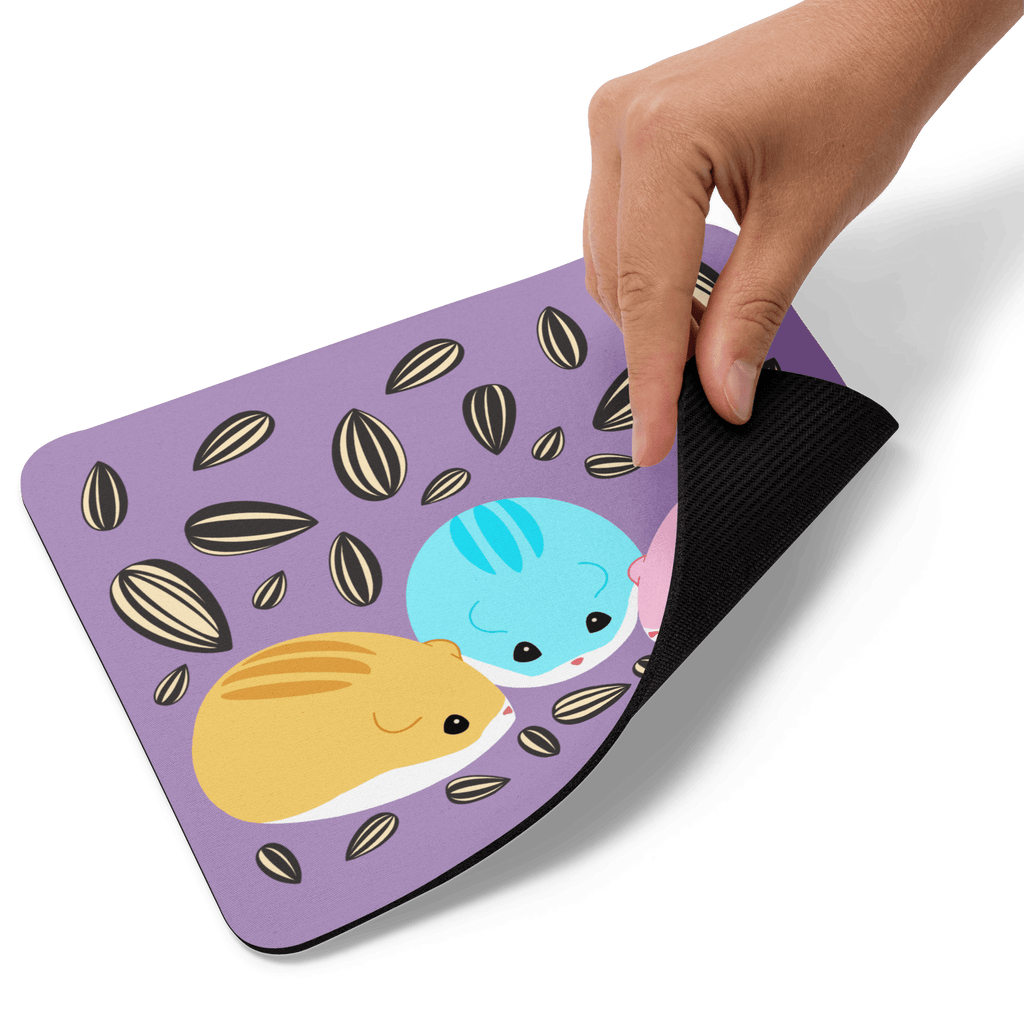 Colourful Sunflower Seeds Mouse Pad for Hamsters in use with a stylish computer mouse on top, highlighting the soft fabric and rubber grip, size 23.5cm x 19.7cm.