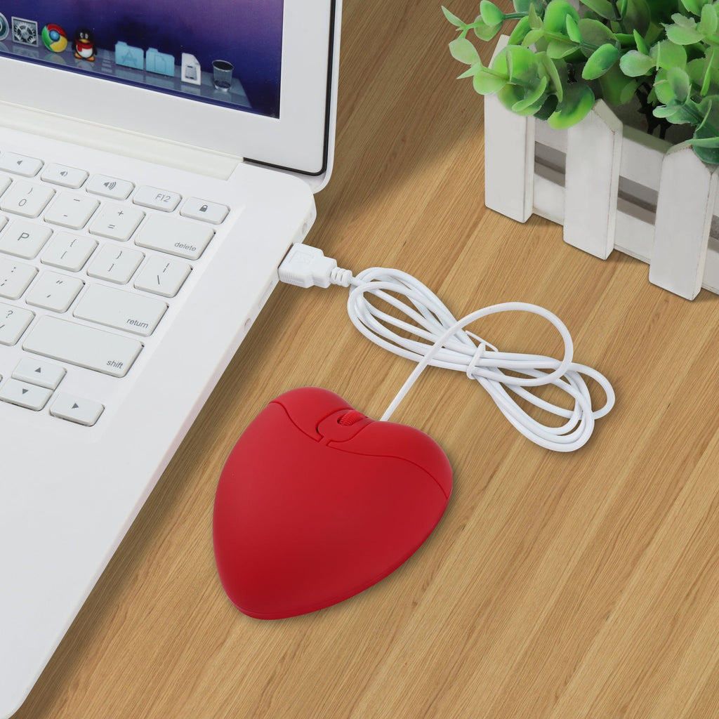 Fun Wired Heart-Shaped Computer Mouse in use at a desk, showing ergonomic comfort and compatibility with various operating systems.