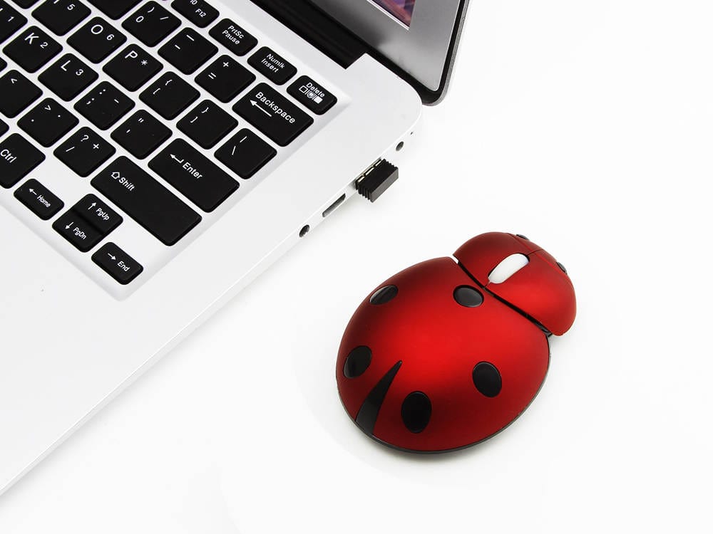 Compact and cute wireless ladybird mouse with 1200 DPI and USB connectivity, great gift for tech and nature lovers.