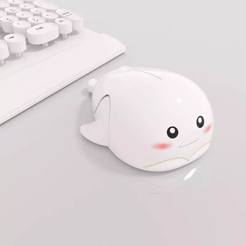 Wireless Whale Computer Mouse displayed on a desk, showcasing its fun design - Fully Rechargeable, Ergonomic Design, Multi-OS Compatible from MouseShopUK.